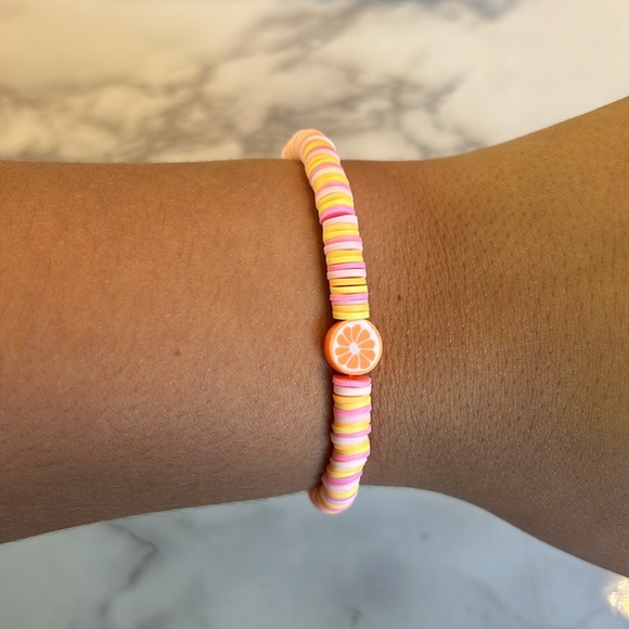 Women’s orange bracelet - Picture 2 of 2